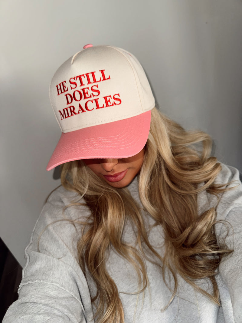 He Still Does Miracles Trucker Hat